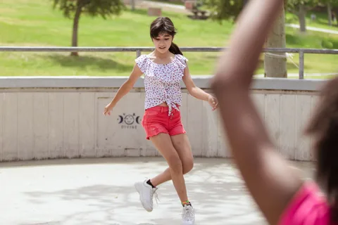 Children enjoying a group activity in a sunny park.