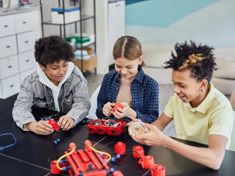 Children collaborating on a robotics project.